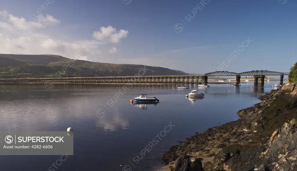 Wales, Gwynedd, Mawddach Estuary. A panoramic view of Barmouth Bridge (Pont Abermaw) which spans the Afon Mawddach river between Morfa Mawddach and Barmouth.