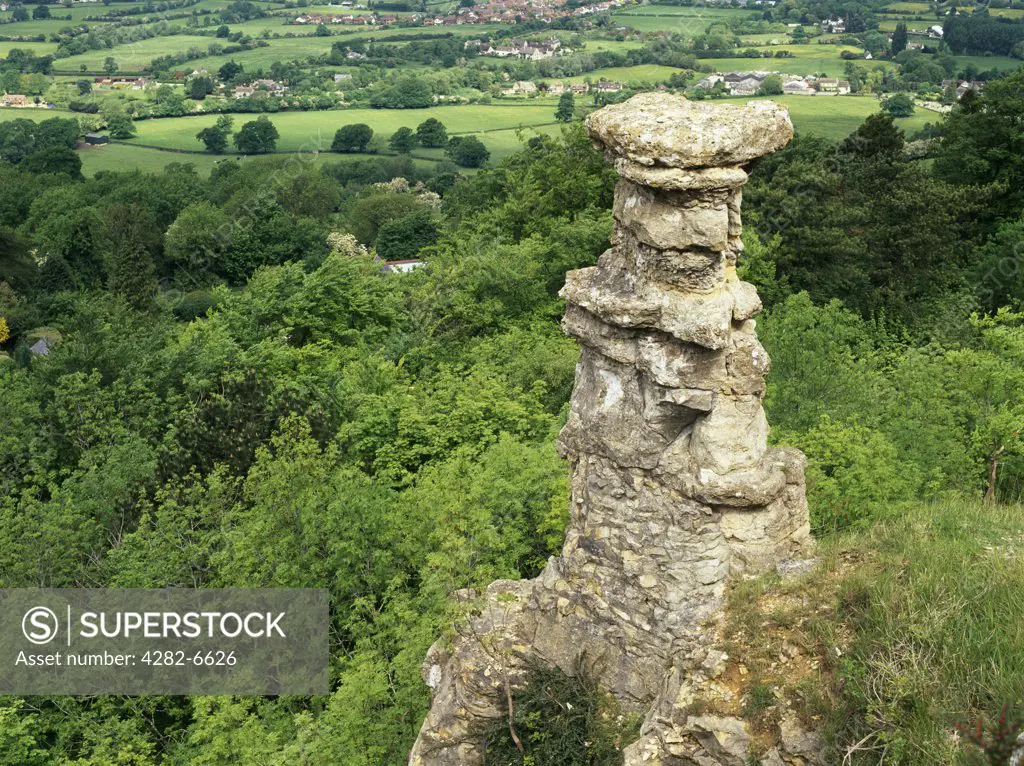 England, Gloucestershire, Leckhampton. The Devils Chimney, a limestone rock formation that stands above a disused quarry in Leckhampton.