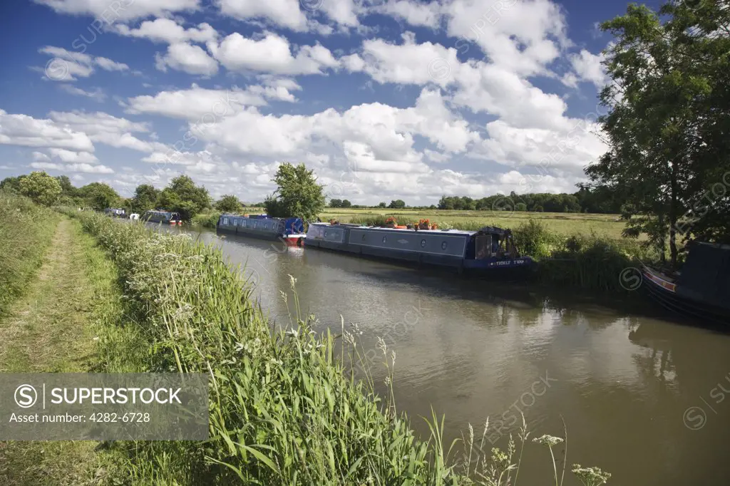 England, Wiltshire, Near Woodborough. Narrow boats on the Kennet & Avon Canal.