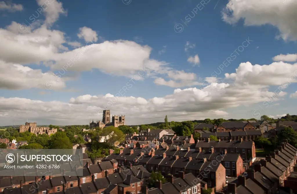 England, County Durham, Durham. View over rooftops towards Durham Cathedral and Durham Castle.