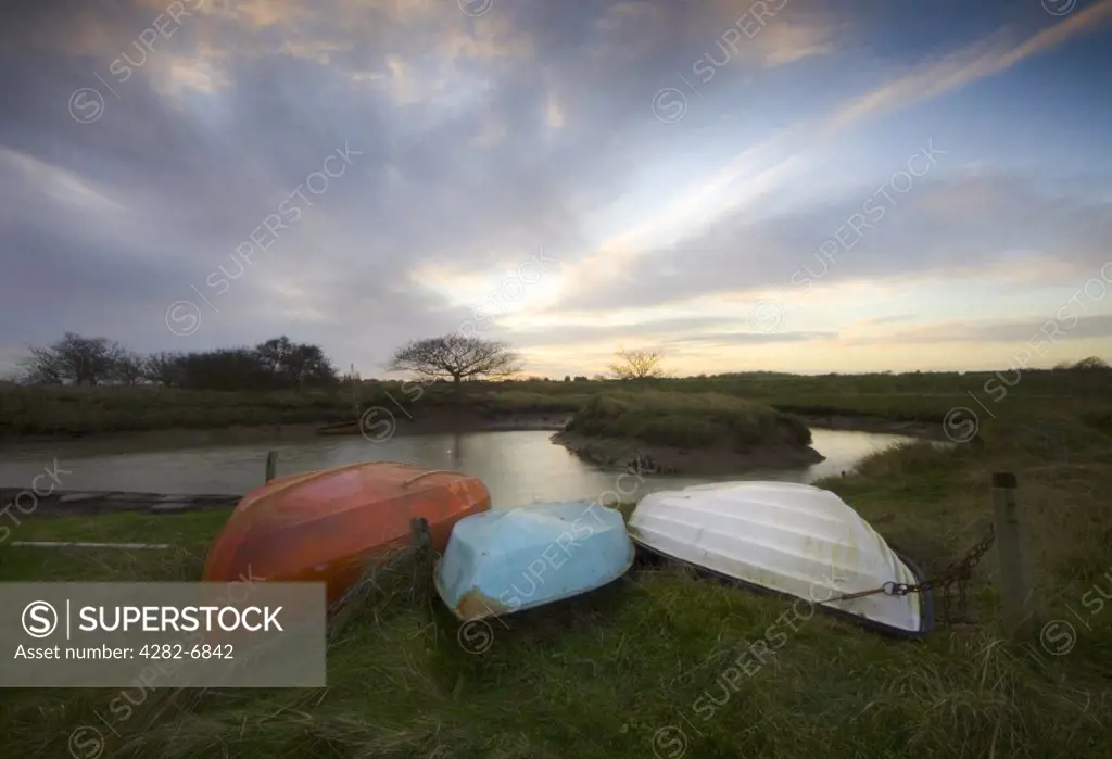 England, Essex, Beaumont-Cum-Moze. The quay at sunrise with boats. It is thought there may have been quay here in Roman times because Roman pottery has been unearthed and evidence of producing salt from seawater has been found.