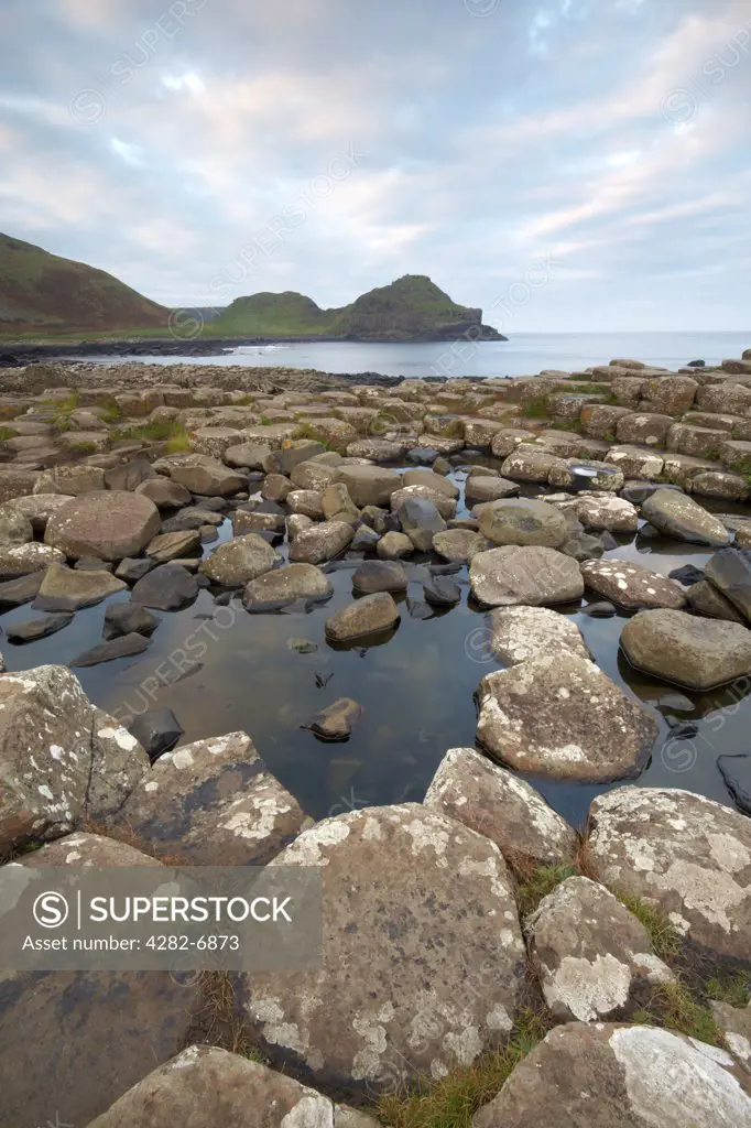 Northern Ireland, County Antrim, Giants Causeway. Interlocking basalt columns of the Giants Causeway, named as the fourth natural wonder in the UK, County Antrim.