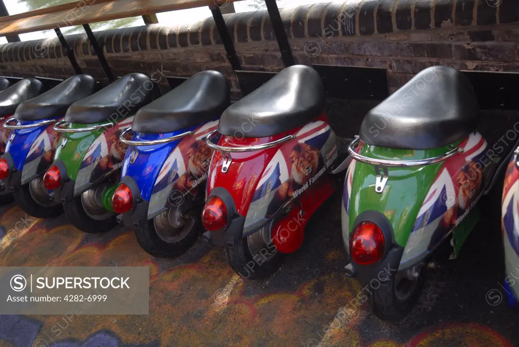 England, London, Camden. Novelty stools in the shape of scooters in Camden market.