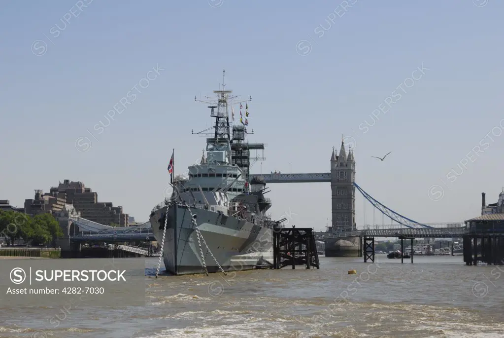 England, London, HMS Belfast and Tower Bridge. HMS Belfast and Tower Bridge on the River Thames.