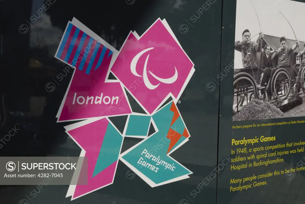 England, London, Stratford. The London 2012 Paralympic games logo and information on hoardings outside Stratford underground station.