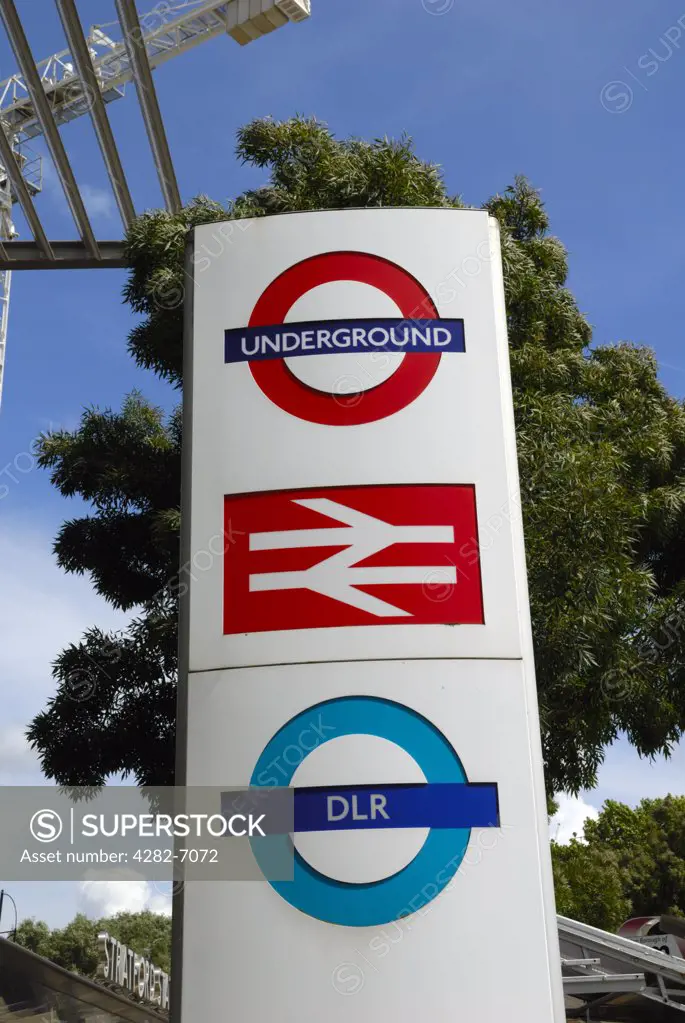 England, London, Stratford. Underground, overground and DLR (Docklands Light Railway) sign outside Stratford station.