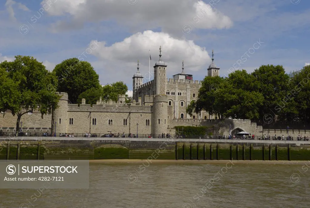 England, London, Tower of London. The Tower of London viewed from a boat on the River Thames.