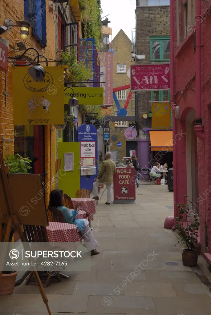 England, London, Covent Garden. Neal's Yard, a small courtyard of shops and open air cafes offering a quiet haven away from the commercial bustle of Covent Garden.