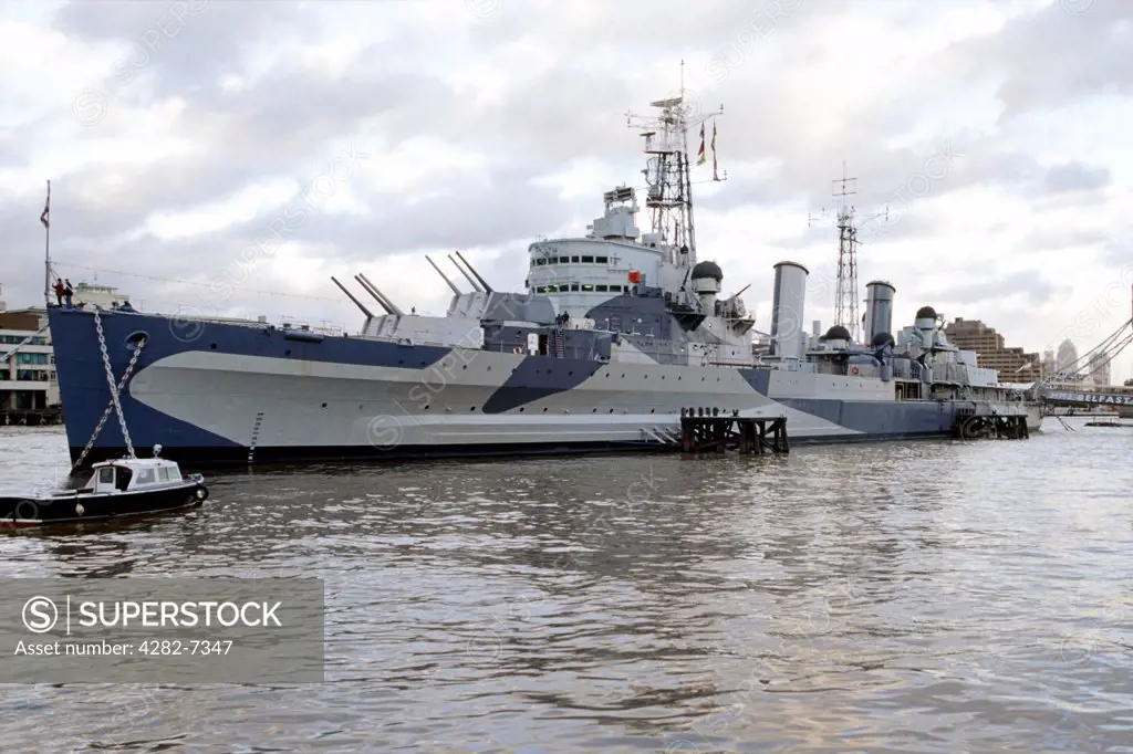 England, London, South Bank. HMS Belfast, moored on the River Thames.