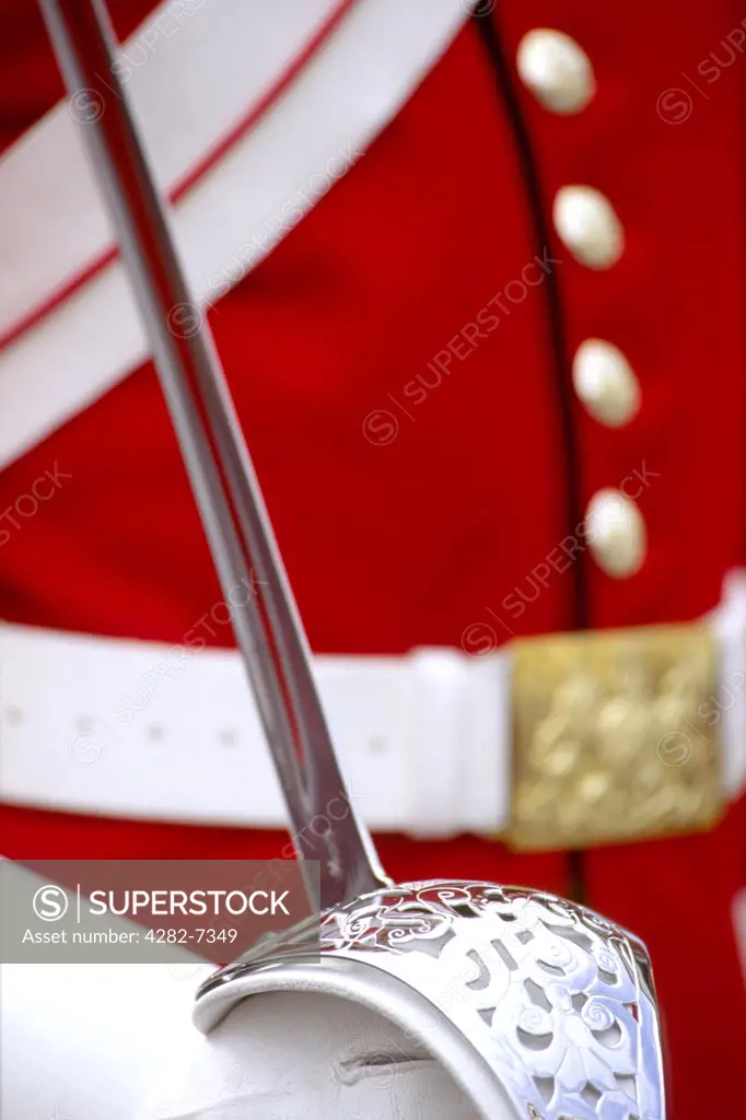England, London, Horse Guards Parade. Close up of a  Horse Guards' uniform and sword handle.