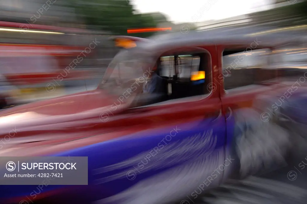 England, London, London. Abstract shot of a London cab. The first hackney carriage dates back to 1662 and was a horse-drawn carriage.