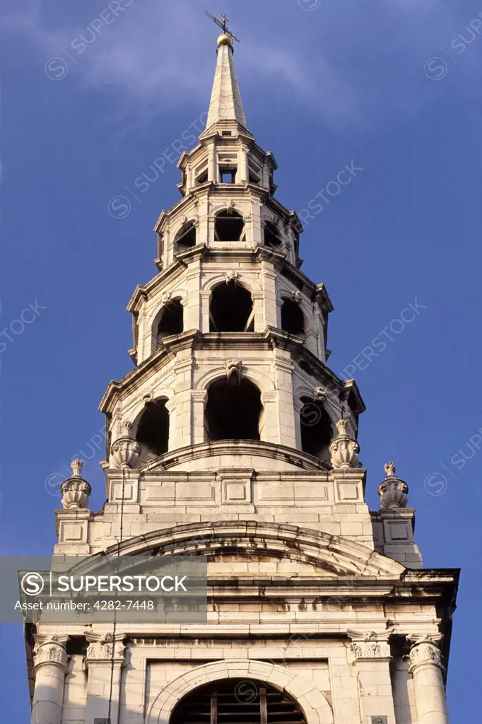 England, London, London. The steeple of St Bride's Church in London. Built in the 11th century, the tiered spire is said to be the inspiration for the design of modern tiered wedding cakes.