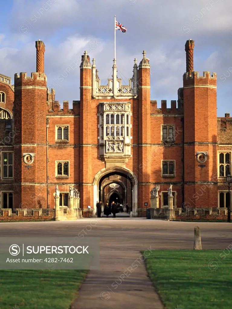 England, Surrey, Hampton Court. The west entrance to Hampton Court Palace. The first buildings at Hampton Court belonged to the Knights Hospitallers back in 1236 and was used as an agricultural grange.