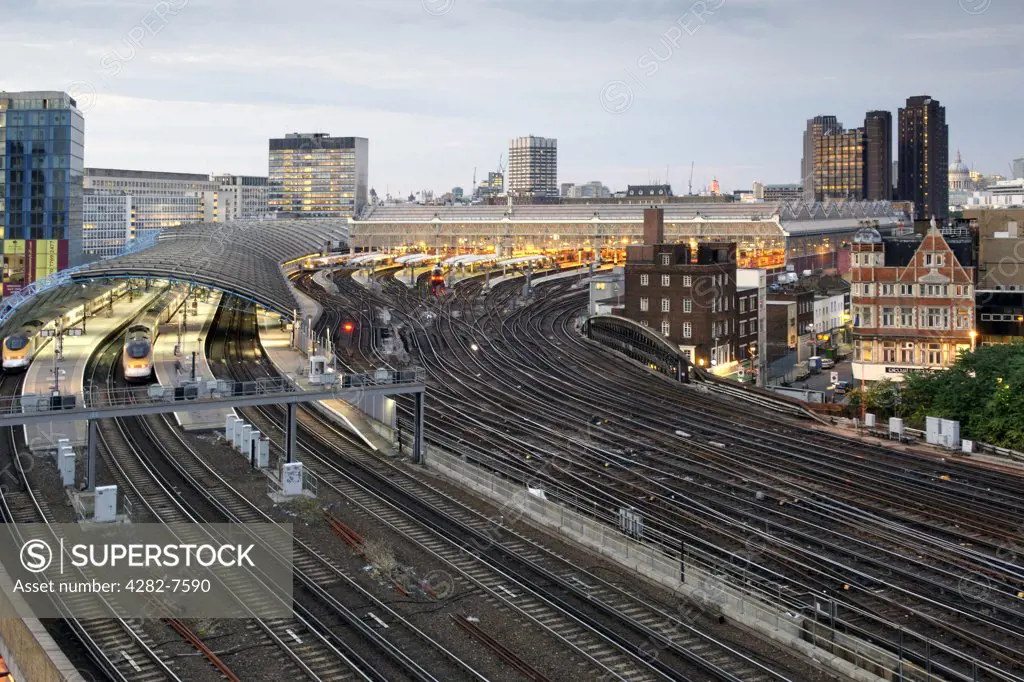England, London, Waterloo. Dusk view of empty tracks leading to Waterloo train station.