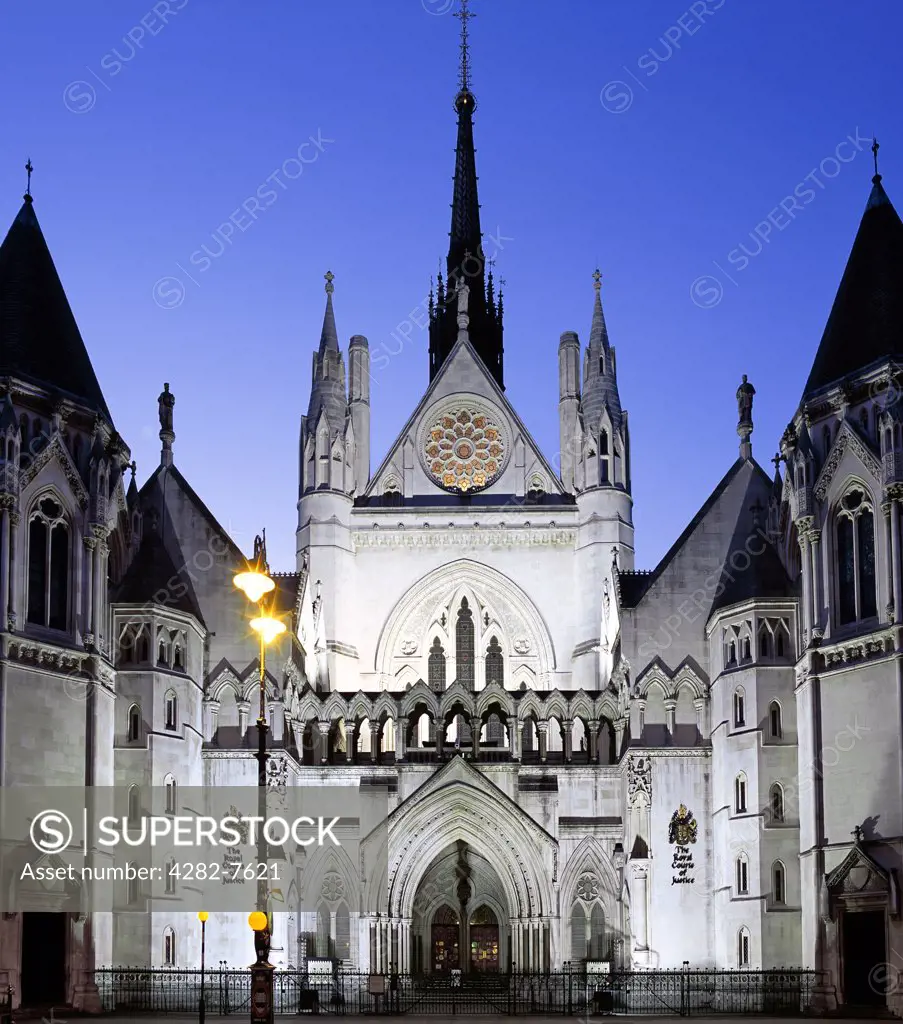 England, London, The Strand. The Royal Courts of Justice in London at dusk.