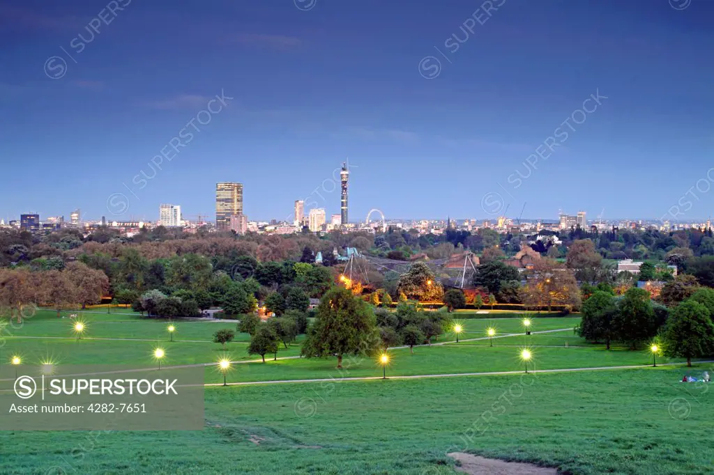 England, London, Primrose Hill . A view of the London skyline from Primrose Hill showing the BT Tower and the London Eye.