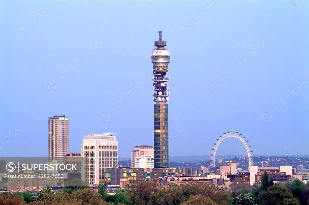 England, London, Primrose Hill . A view of the London skyline from Primrose Hill showing the BT Tower and the London Eye.