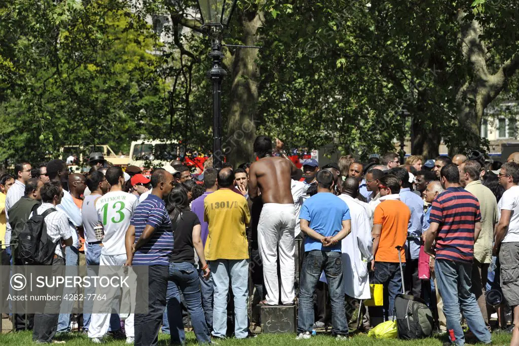 England, London, Hyde Park. A large crowd listening to a speaker at Speakers' corner in Hyde Park.