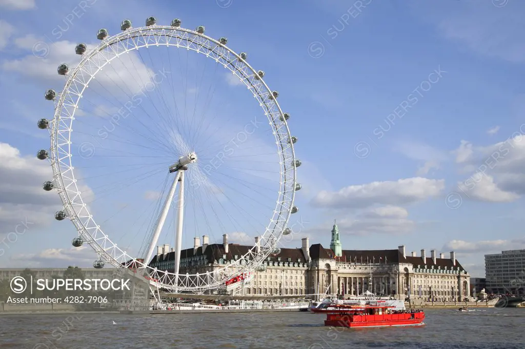England, London, South Bank. A view across the River Thames towards the London Eye.