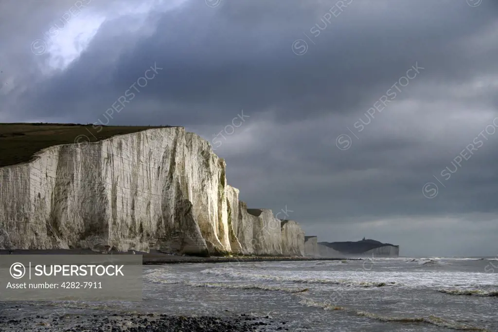 England, East Sussex, Cuckmere Haven. Looking towards the series of seven chalk cliffs known as the Seven Sisters.