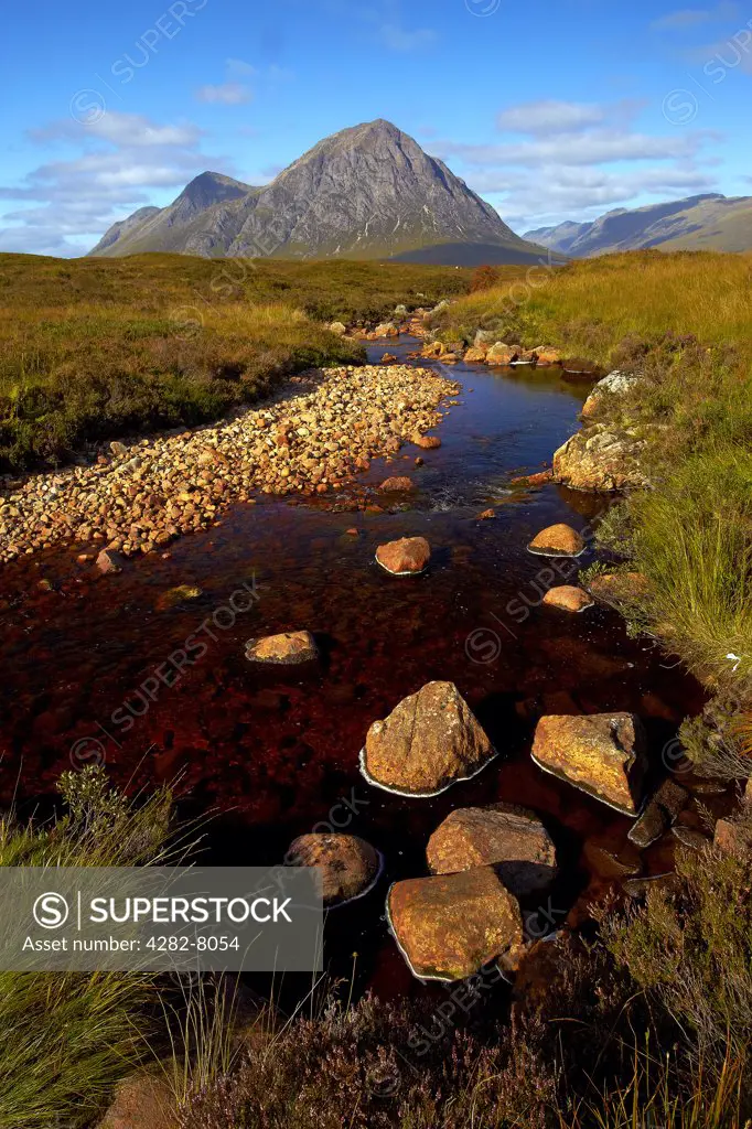Scotland, Highland, Rannoch Moor. Buachaille Etive Màö§r, a mountain standing guard at the entrance to Glen Etive. It's almost perfect pyramid shape has made it one of the most popular and recognisable mountains in Scotland.