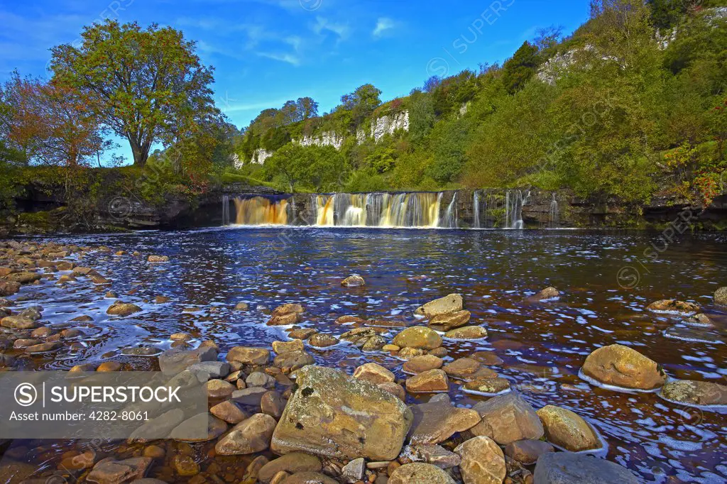 England, North Yorkshire, Keld. Autumnal view of Wain Wath Force, a waterfall on the River Swale in the Yorkshire Dales National Park.