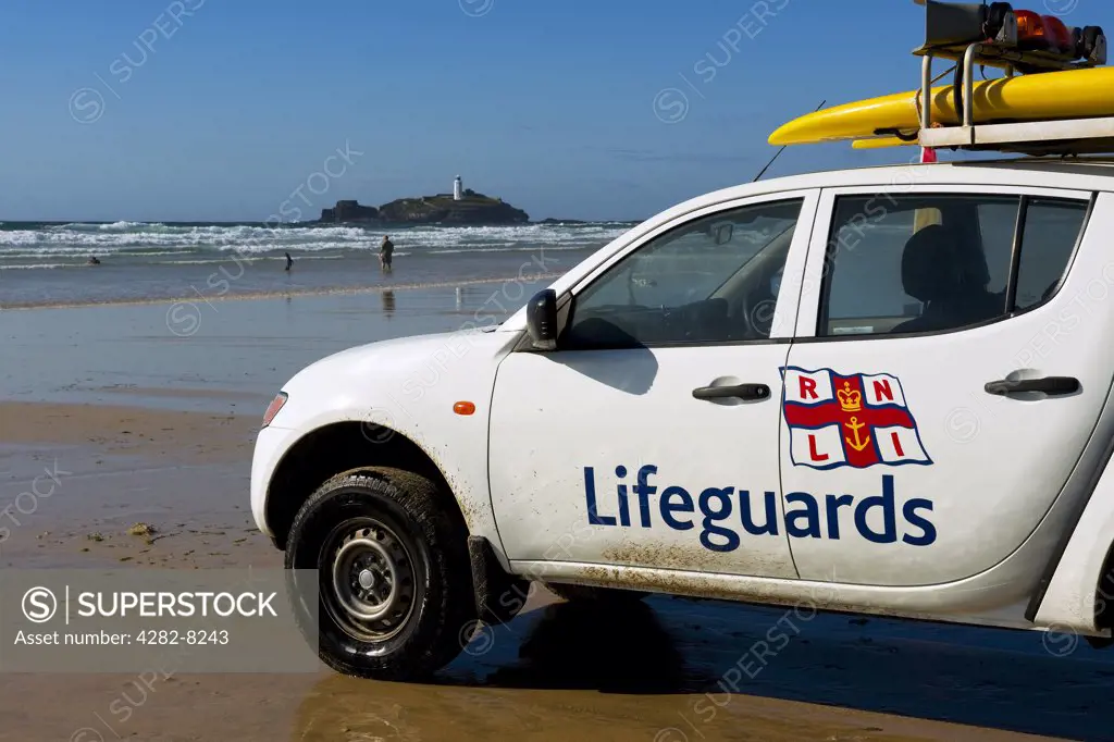 England, Cornwall, Gwithian. A RNLI Lifeguard 4 x 4 emergency vehicle parked on Gwithian Beach.