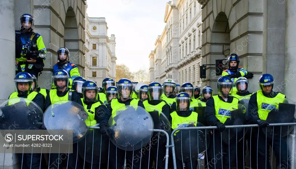 England, London. Metropolitan police in riot gear at a student demonstration.