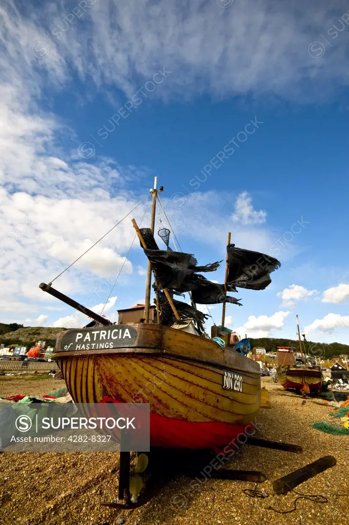 England, East Sussex, Hastings. Fishing boat beached on the Stade at Hastings.