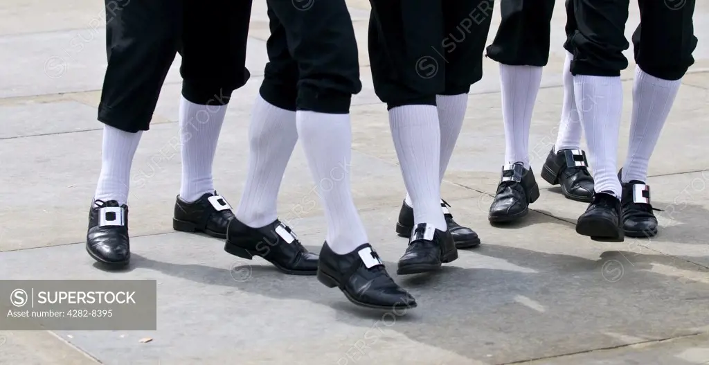 England, London, Trafalgar Square. The legs of Monk Seaton Morris Men dancing at the Westminster Day of Dance in Trafalgar Square.