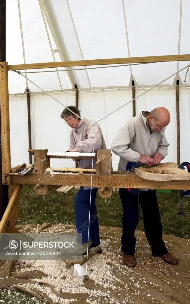 England, Essex, Basildon. Traditional chairmakers demonstrating their craft at the Essex County Show.