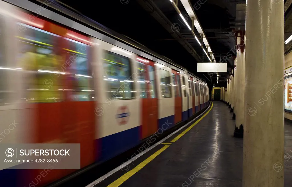 England, London, Temple. A tube train arriving at Temple Underground Station.