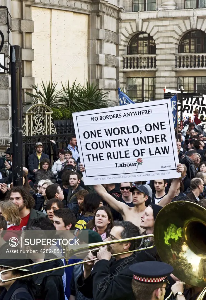 England, London, City of London. Protestors marching at the G20 demonstration in the City of London.