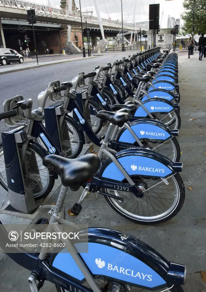 England, London, Westminster. A row of bikes in a Barclays Cycle Hire docking station.