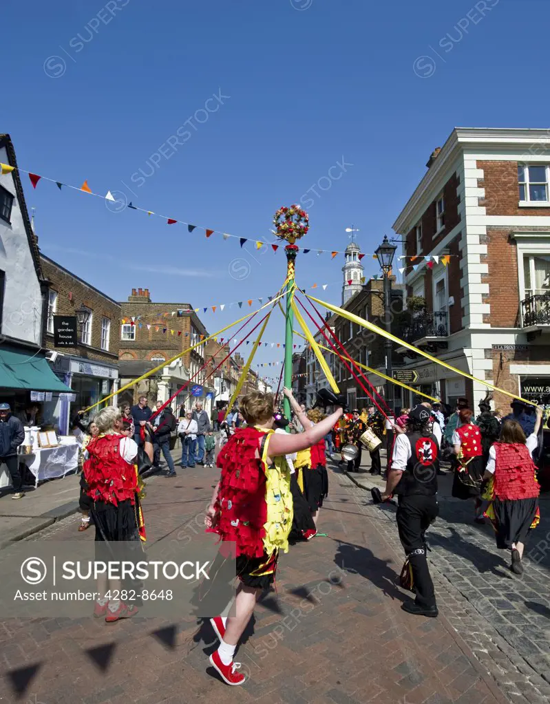 England, Kent, Rochester. Kent Korkers and Pork Scratchins Morris sides performing a maypole dance at the annual Sweeps Festival in Rochester.