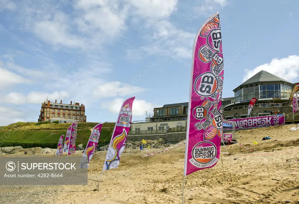 England, Cornwall, Newquay. Banners on Fistral Beach advertising Summer Break, a four day event at the end of the student year offering parties, beach games, raves and BBQ's.