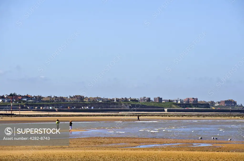 England, Kent, Margate. People on Margate beach at low tide.