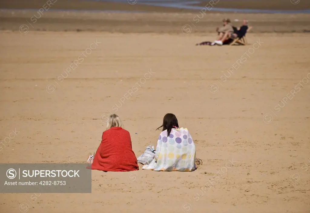 England, Kent, Margate. People relaxing on Margate Sands.
