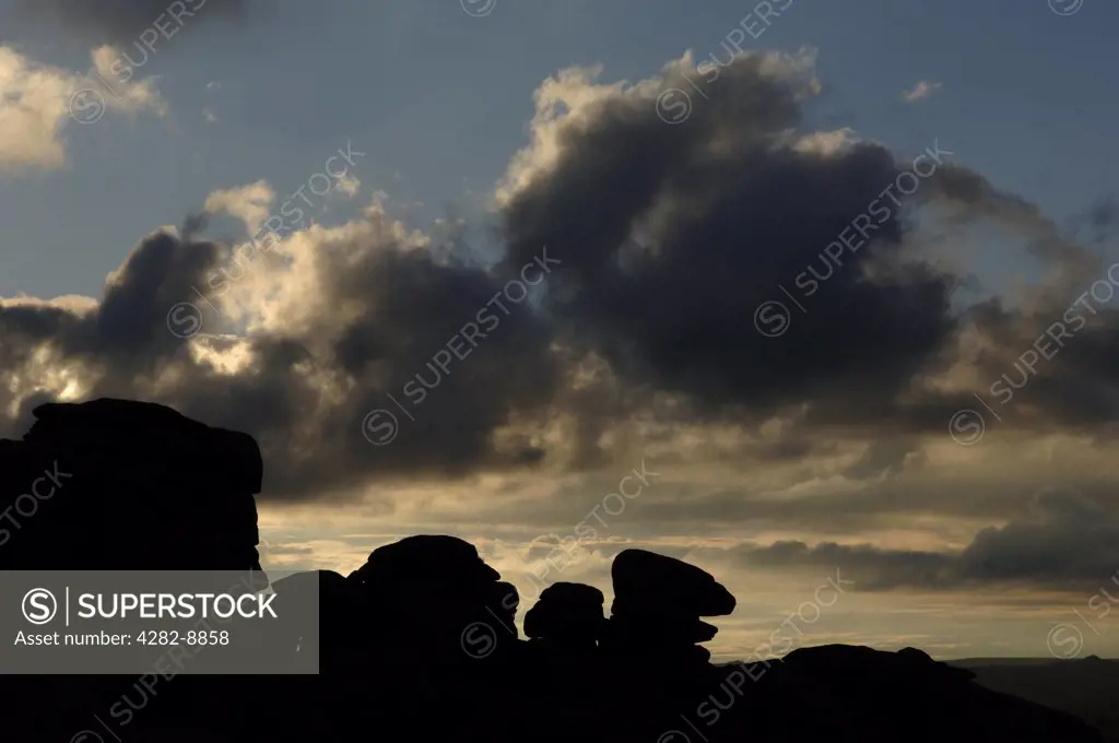 England, Devon, Combestone Tor. Silhouette of Combestone Tor on Dartmoor in Devon.
