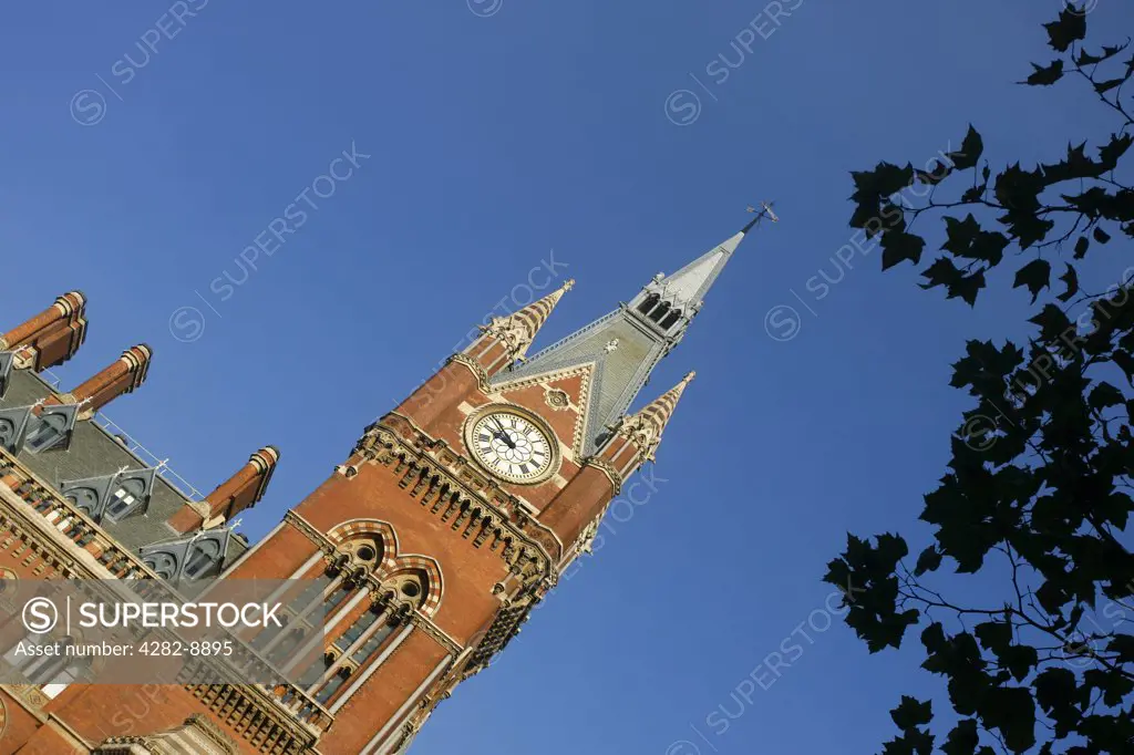 England, London, St Pancras. The Victorian architecture and clock tower of St Pancras Station in London.