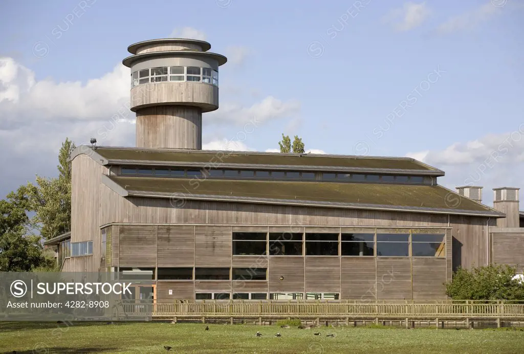 England, Gloucestershire, Slimbridge. The visitor centre at Slimbridge Wetland Centre, one of nine Wildfowl and Wetlands Trust (WWT) centres in the UK that allow people to enjoy wetland habitats.