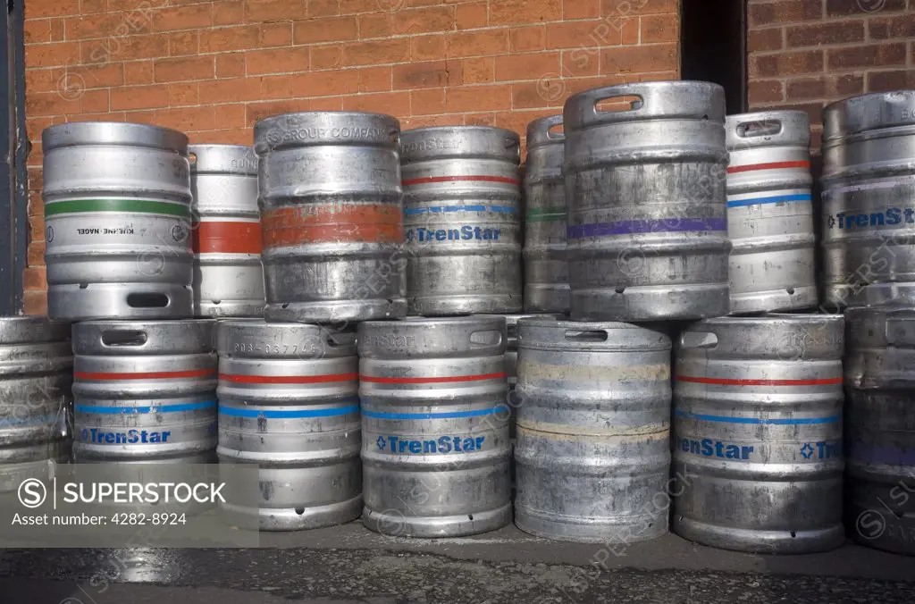 England, West Midlands, Birmingham. Empty beer kegs outside a pub.