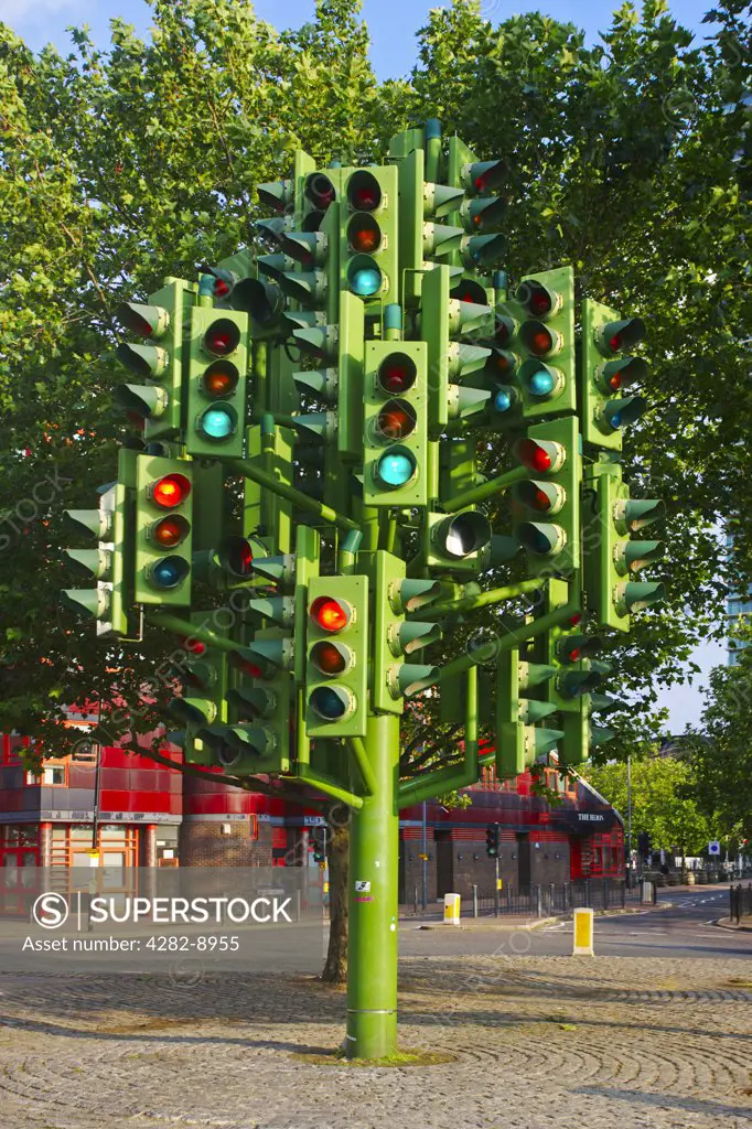 England, London, near Canary Wharf. The Traffic Light Tree created by French sculptor Pierre Vivant near Canary Wharf.