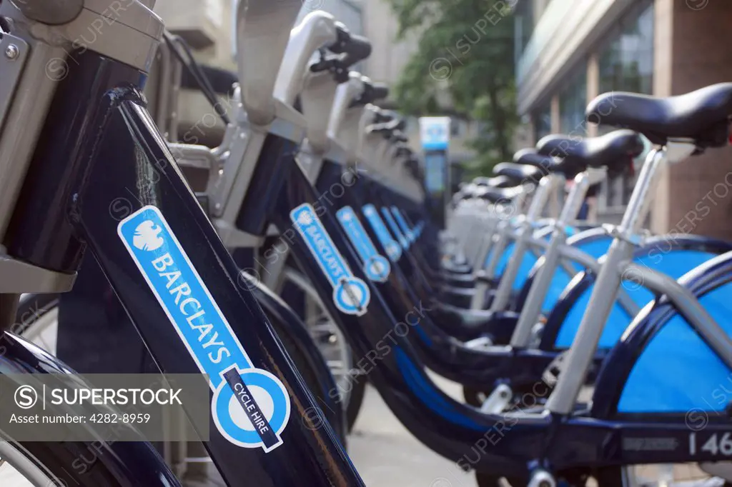 England, Greater London, London. Barclays Cycle Hire bikes parked in a docking station.