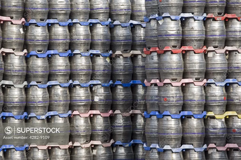 England, West Yorkshire, Leeds. Beer kegs stacked at the Carlsberg Tetley brewery in Leeds.