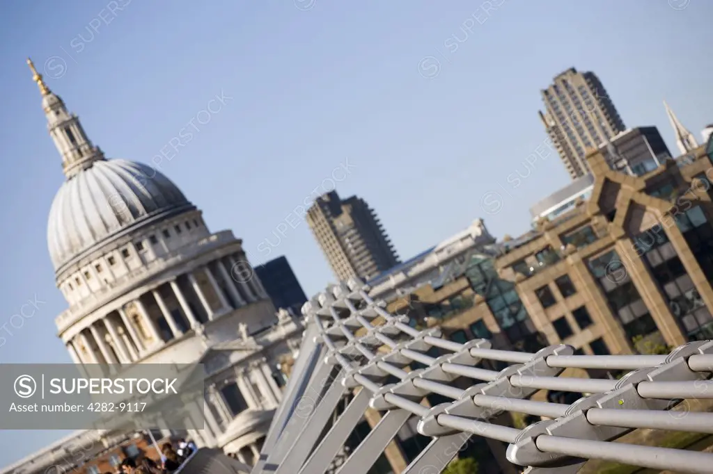 England, London, Millennium Bridge. The Millennium Bridge and St Paul's Cathedral in London.
