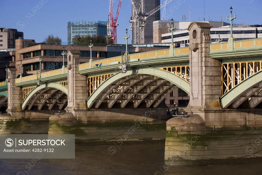 England, London, Southwark Bridge. Southwark Bridge connecting Southwark on the South Bank and the City of London on the North Bank of the River Thames.
