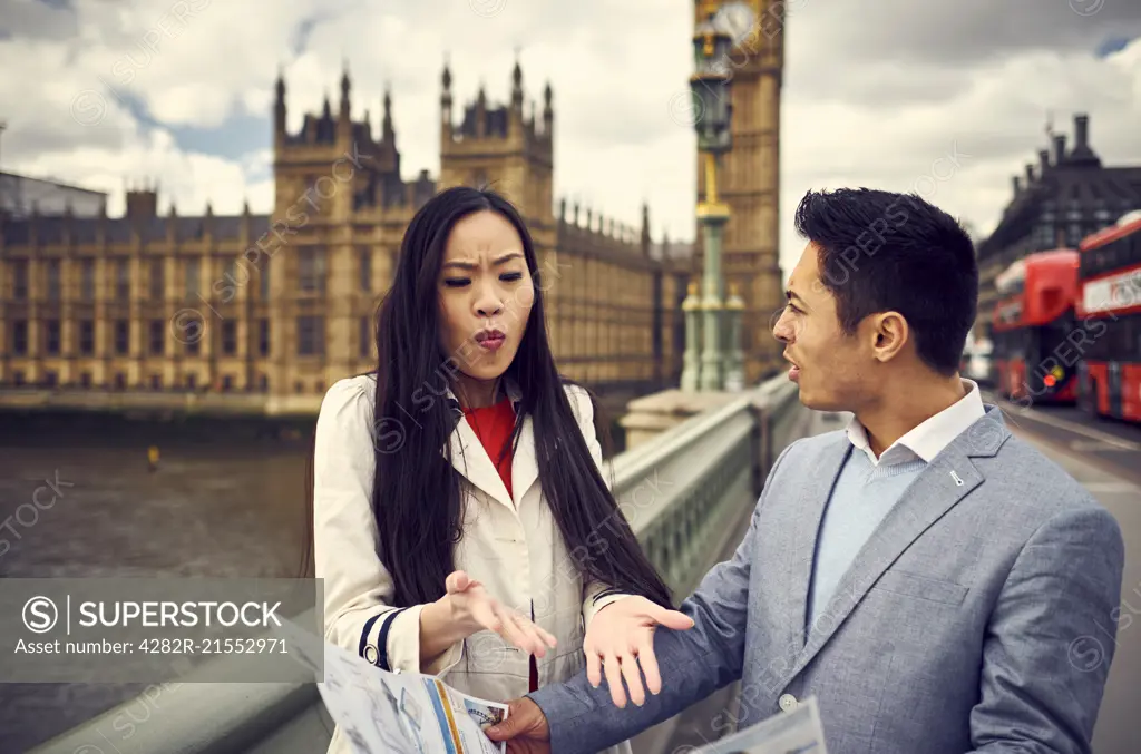 A young Japanese couple sightseeing in London.