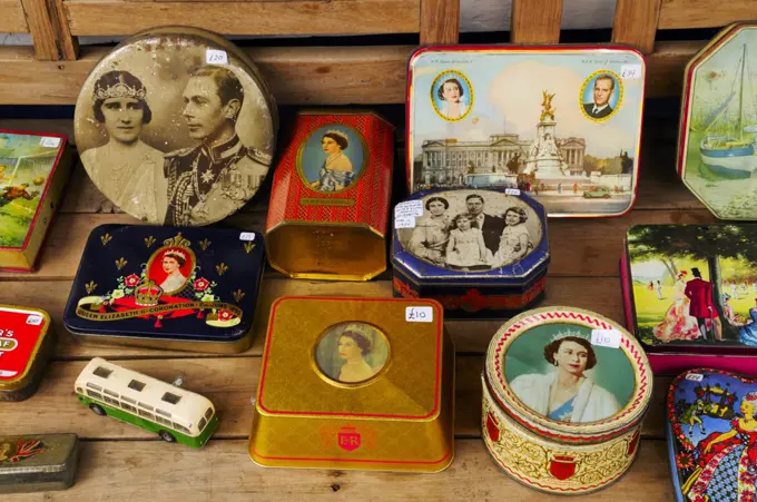 England, London, Notting Hill. British Royal Family commemorative memorabilia on sale at Portobello Road Antiques Market.