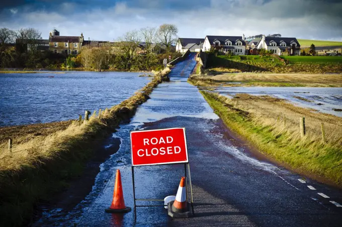 Scotland, South Lanarkshire, River Clyde. Road closed due to floodwater from the River Clyde in South Lanarkshire.